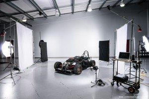 Behind the scenes set up for the studio car shots. 8 lights and 2 power packs.