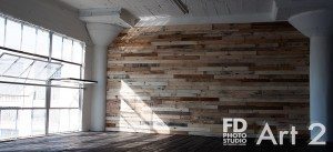 Art 2 with a reclaimed wood wall