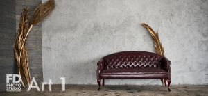 red sofa in a natural light studio