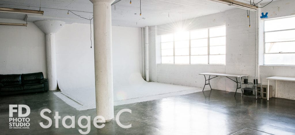 Rent Photo Studio with cyc wall, grass wall and white wood floor