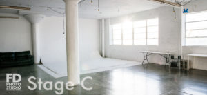 Rent Photo Studio with cyc wall, grass wall and white wood floor
