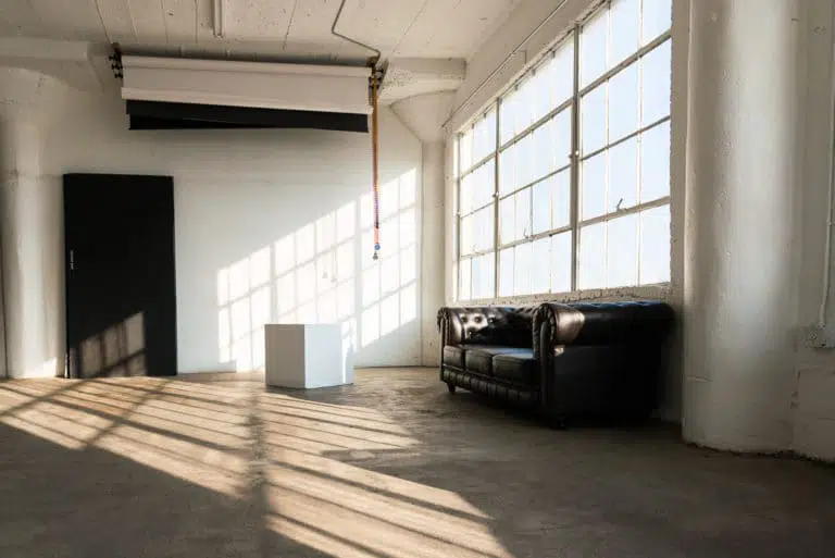 natural light photo studio with white staircase