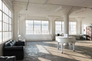 natural light photo studio with white staircase