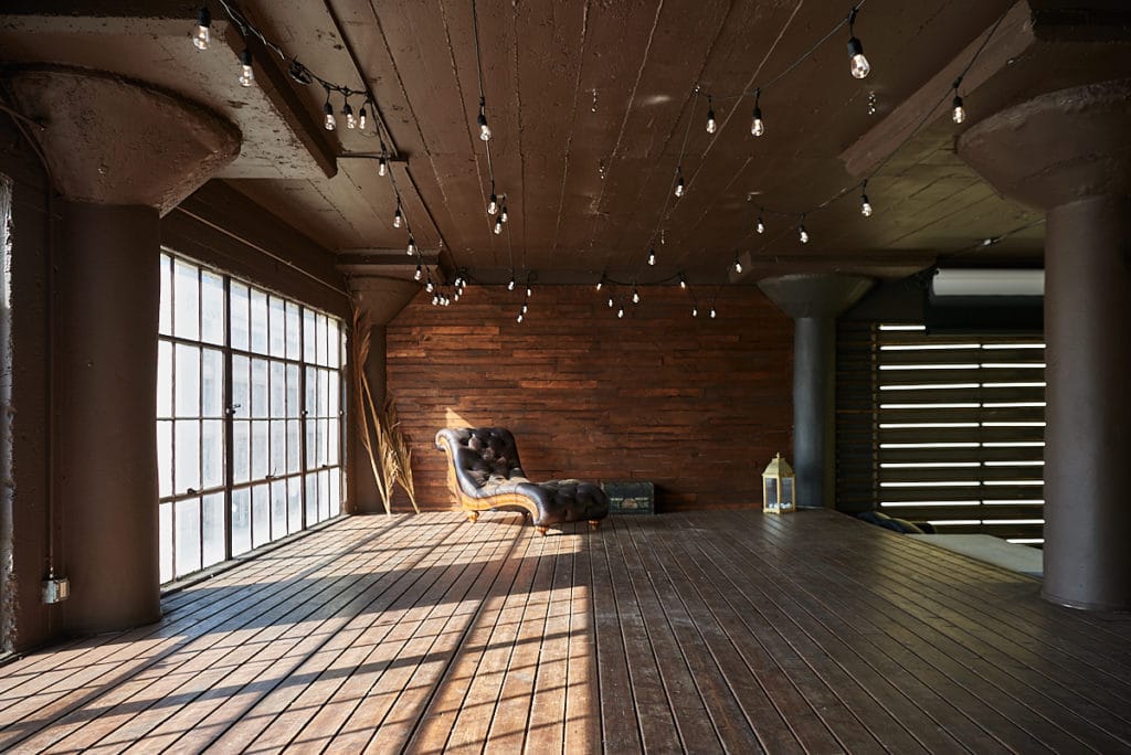 Wooden stage with LED lamps available for photo and video rental in Los Angeles