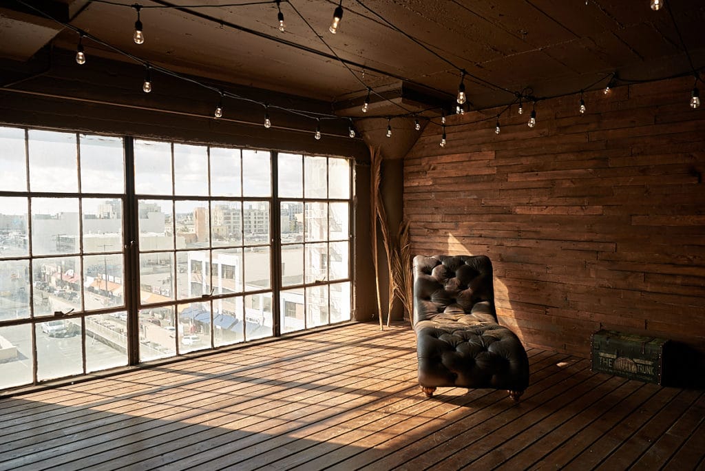 Wooden stage with LED lamps available for photo and video rental in Los Angeles
