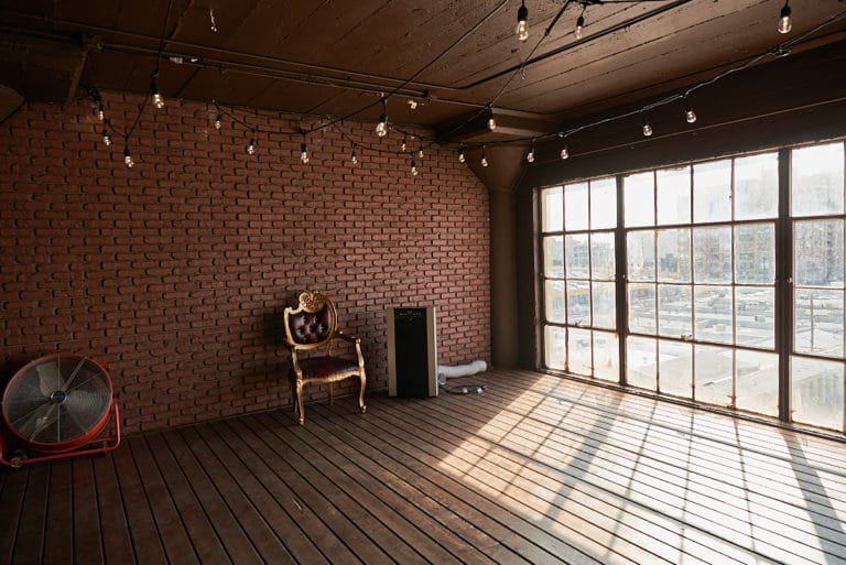 Wooden stage with LED lamps available for photo and video rental in Los Angeles