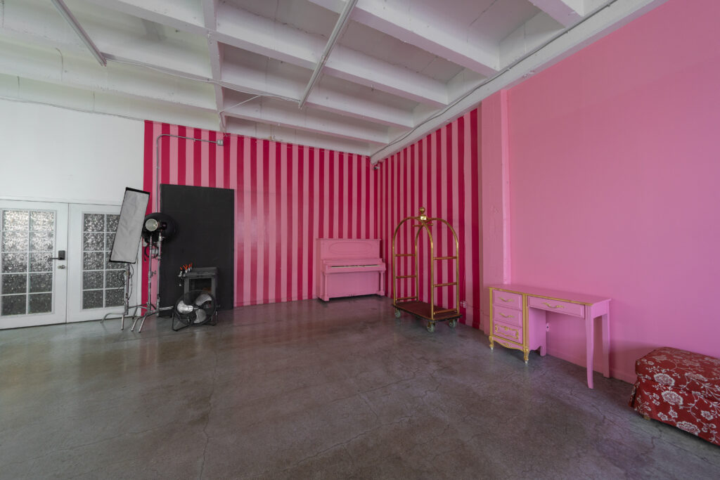 Hill 5 - daylight photo studio with pink and white walls with piano in Los Angeles