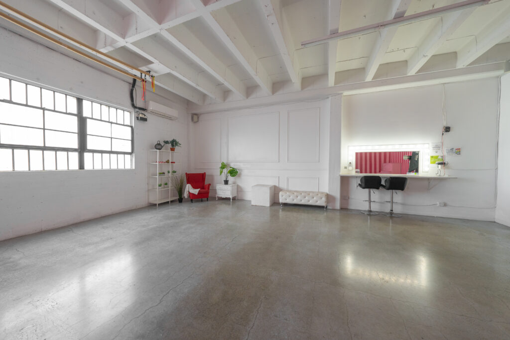 Hill 5 - daylight photo studio with pink and white walls with piano in Los Angeles