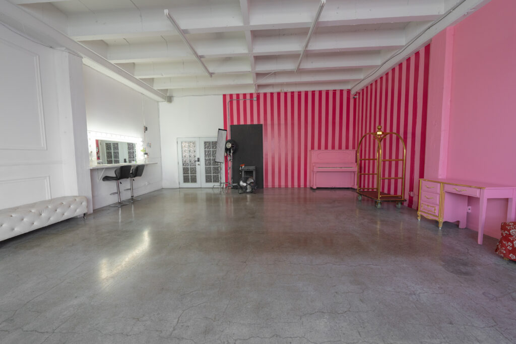 Hill 5 - daylight photo studio with pink and white walls with piano in Los Angeles