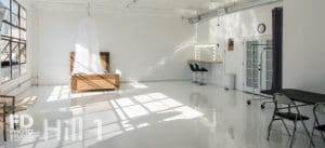 Natural light photo studio with high-gloss white floors available for rental in Los Angeles