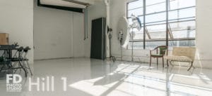 Natural light photo studio with high-gloss white floors available for rental in Los Angeles