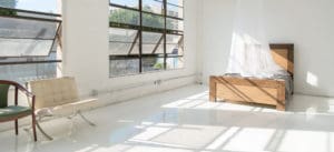 Natural light photo studio with high-gloss white floors available for rental in Los Angeles