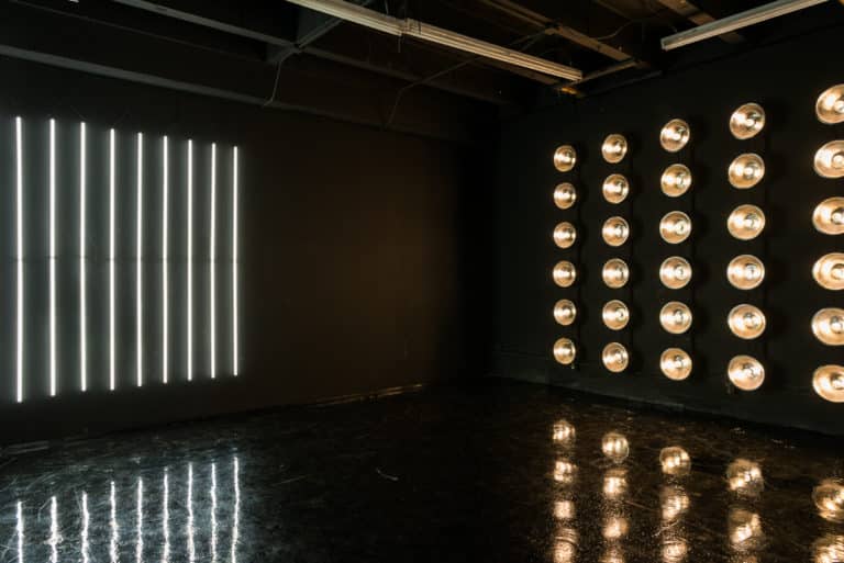 LED dimmable lights & black glossy floor blackout stage is available for photo and video rentals in Los Angeles