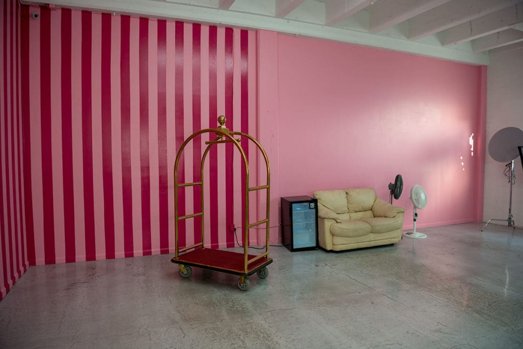 Carnation and gloss dark pink stripped corner available for photo and video photo studio rental in Los Angeles
