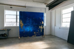 gold and royal blue sequin backdrop available with Stage C rental
