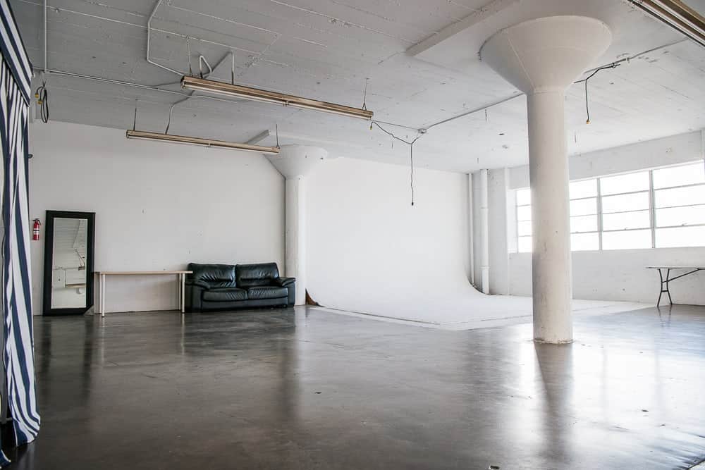Rent Photo Studio with white cyclorama wall, grass wall and white wood floor