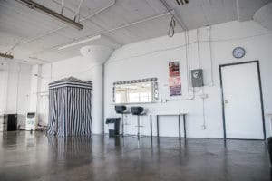 Rent Photo Studio with white cyclorama wall, grass wall and white wood floor