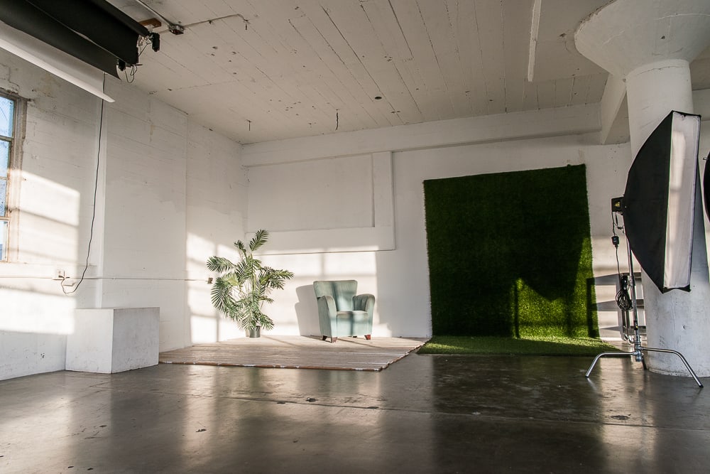 Rent Photo Studio with white cyclorama wall, grass wall and white wood floor