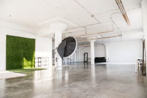 Rent Photo Studio with white cyclorama wall, grass wall and white wood floor