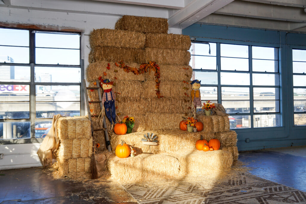 Daylight photo studio Hill 4 in Los Angeles with hay bale and Halloween decorations