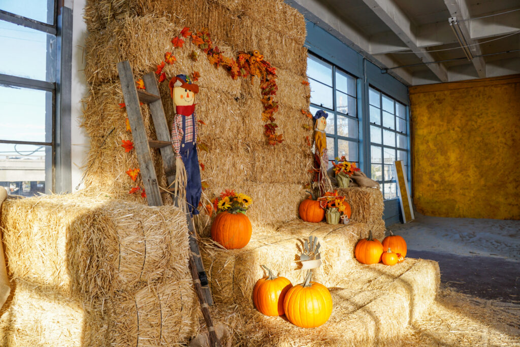 Daylight photo studio Hill 4 in Los Angeles with hay bale and Halloween decorations
