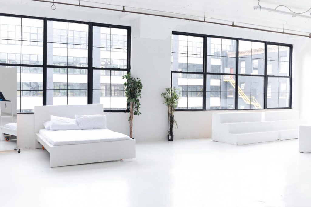 LIC 1 - photo studio with cyc wall, west-facing windows, lots of natural light, and white floors in NY