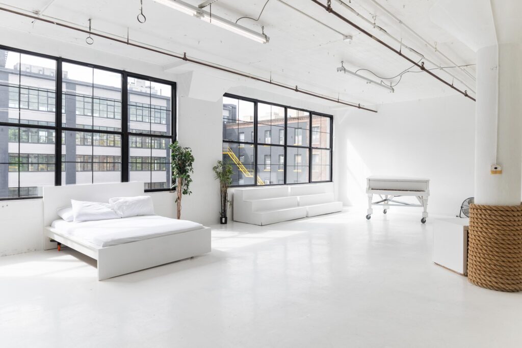 LIC 1 - photo studio with cyc wall, west-facing windows, lots of natural light, and white floors in NY