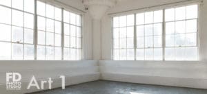 natural light photo studio with white staircase