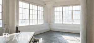natural light photo studio with white staircase