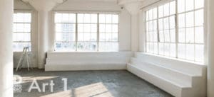 natural light photo studio with white staircase