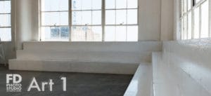 natural light photo studio with white staircase