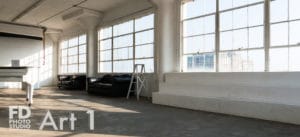 natural light photo studio with white staircase
