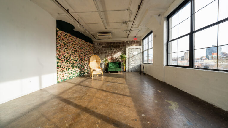 LIC 6 – Photo Studio for Rent with Flower Wall and Exposed Block Wall in New York - FD Photo Studio