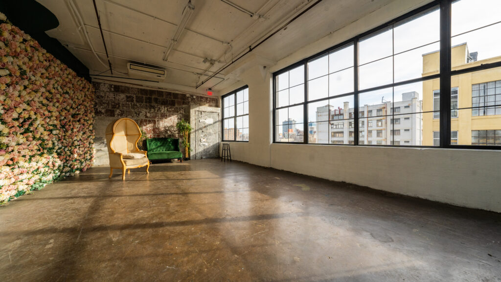 LIC 6 - photo studio with flower wall and exposed block wall in NY