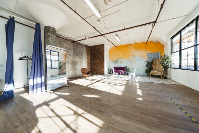 LIC 7 - Loft-like daylight photo studio for rent in near me in New York with Moroccan tile, textured yellow wall