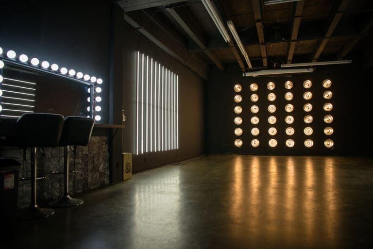 Black studio with LED dimmable lights available for photo and video rental in Los Angeles Black studio with LED dimmable lights available for photo and video rental in Los Angeles