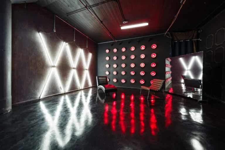 LIC 4 – Blackout Photo Studio for Rent in New York with RGB Lights, X-Lights, Concrete Wall, Black Gloss Floor, and Two Different French Walls - FD Photo Studio