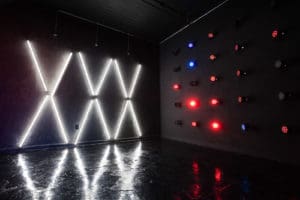 Affordable photo studio with 4 different sets, RGB lights, furniture and additional grip & strobes included, available for rent hourly near New York.