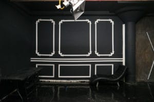 Affordable photo studio with 4 different sets, RGB lights, furniture and additional grip & strobes included, available for rent hourly near New York.