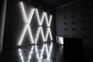 Affordable photo studio with 4 different sets, RGB lights, furniture and additional grip & strobes included, available for rent hourly near New York.