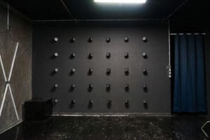 Affordable photo studio with 4 different sets, RGB lights, furniture and additional grip & strobes included, available for rent hourly near New York.