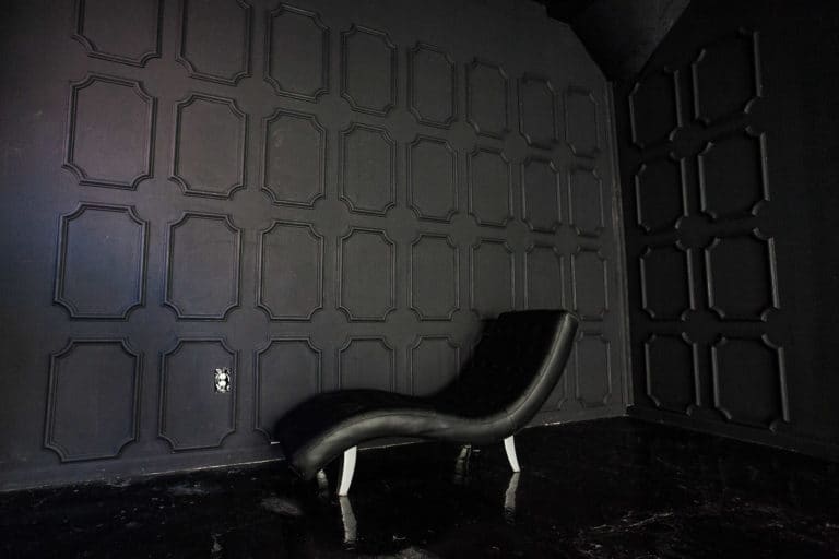 Affordable photo studio with 4 different sets, RGB lights, furniture and additional grip & strobes included, available for rent hourly near New York.