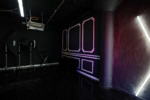 Affordable photo studio with 4 different sets, RGB lights, furniture and additional grip & strobes included, available for rent hourly near New York.