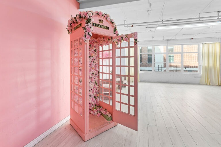 Astoria 3 - daylight photo studio for rent with pink walls and Christmas decorations in New York