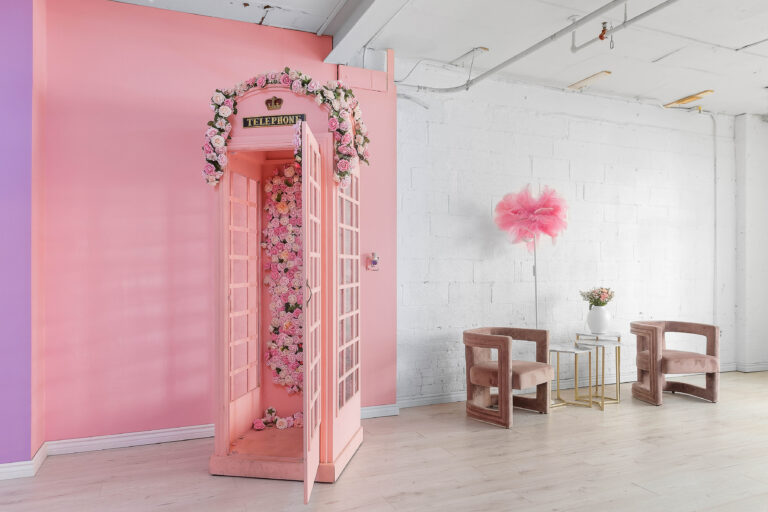 Rental photo studio with hardwood floors, big North facing window, and a pink photo booth - Astoria 3