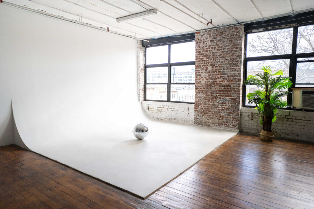 Astoria 8 - photo studio with the white cyc wall at FD Photo Studio NY