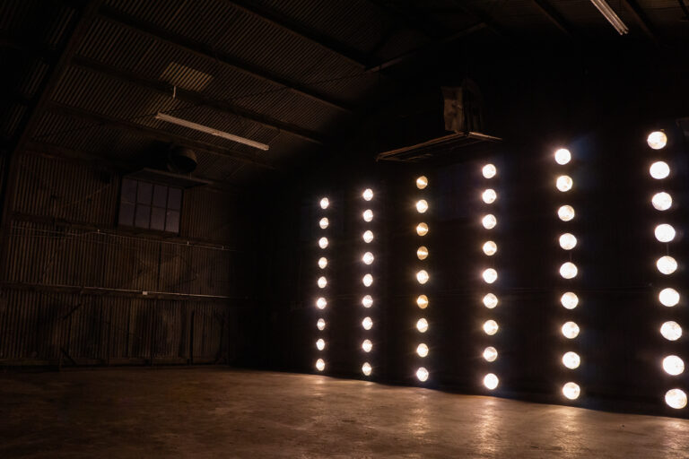 Olympic 5 - Huge metal hangar with car access and dedicated production room, restrooms and MUA tables for rent for photo and filming productions