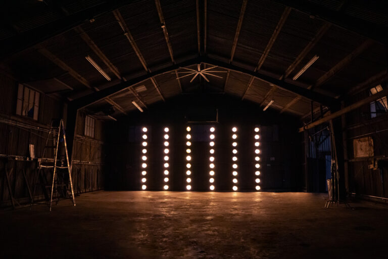 Olympic 5 - Huge metal hangar with car access and dedicated production room, restrooms and MUA tables for rent for photo and filming productions