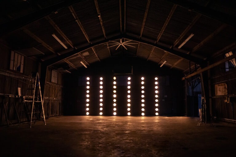 Olympic 5 - Huge metal hangar with car access and dedicated production room, restrooms and MUA tables for rent for photo and filming productions