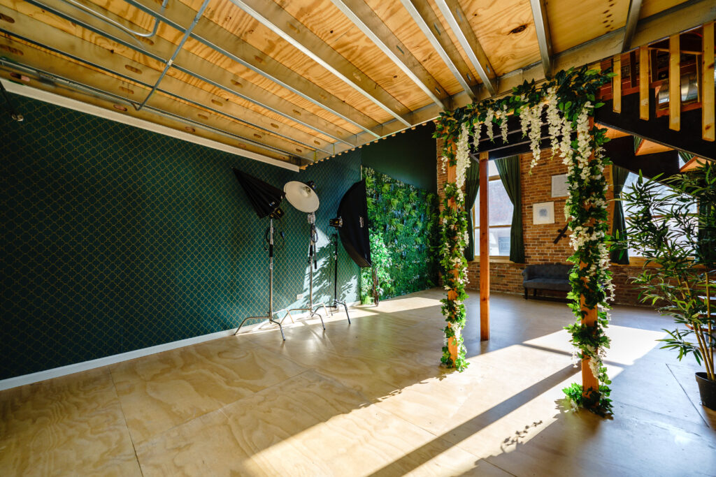 Beautiful daylight photo studio with Jungle & Concrete walls and Neoon Loft on the mezzanine near me Chicago 6
